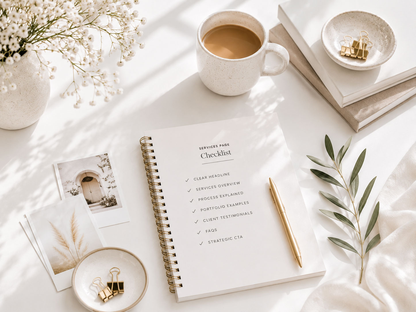 Services page checklist with planning notebook, coffee, and workspace for designing a high-converting website.
